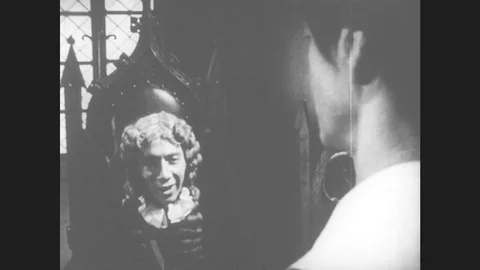 1950s: Lords speak. Prisoner speaks. Man slaps prisoner. Stock Footage