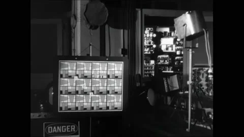 1950s: Man assembles television in RCA labs using a screwdriver Pattern to be Stock Footage 162326986