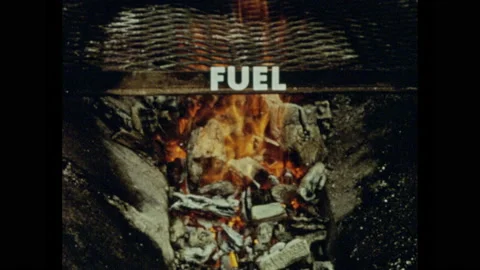 1950s: Man with boy, man puts grate over fire pit. Fire burning in pit, words Stock Footage 157457752