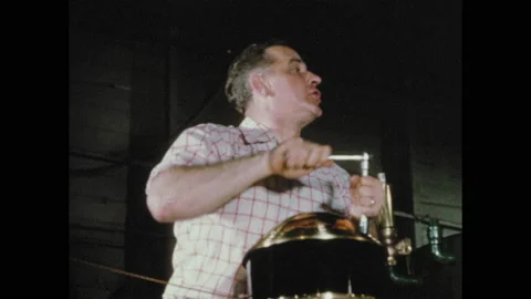 1950s: Man with socket wrench speaks. Hands place sockets and wrenches into tool Stock Footage 155114019