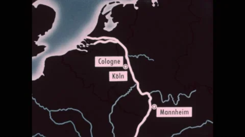 1950s: Map of the Rhine river and various cities along it. Boats anchored by Stock Footage 219815625