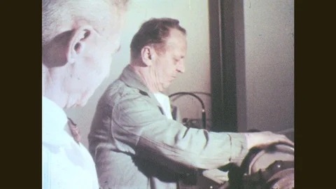 1950s: Men adjust grinding wheel. Boston harbor. Waterfall in the woods. Stock Footage
