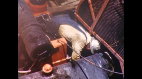 1950s MEN Drilling for Oil Well RIG Workers CAP WELL Vintage Film Home Movie Stock Footage 5088690