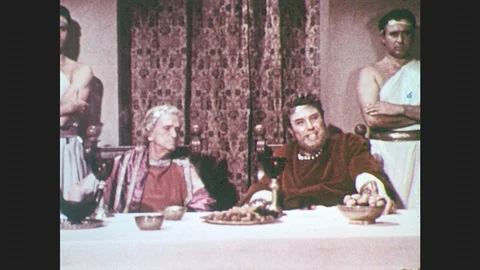 1950s: Men at table, man talking. Close up of woman talking. Man talking at Stock Footage 87269239