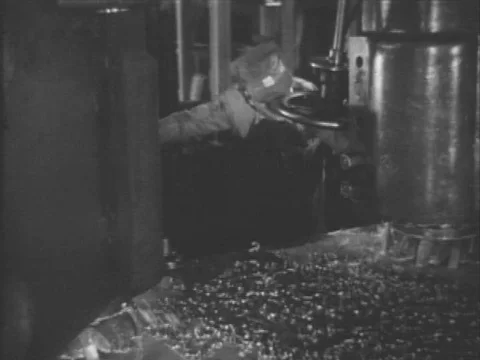 1950s - Metal is shaped through the process of chemical milling at a plant in Stock Footage 82938441