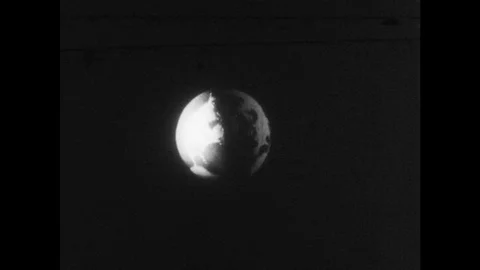 1950s: Model of the earth rotates in spa... | Stock Video | Pond5