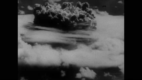 1950s: Mushroom cloud rises from atomic explosion in Hiroshima, Japan. Survivors Stock Footage 159101913