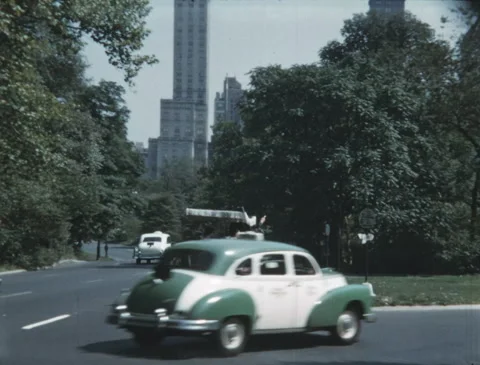 1950s NYC: Checker Cabs on Central Park's Transverse Roads, 16mm Film, 2K Stock Footage 300726695