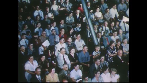 1950s: Pan of audience in stands at circus. Stock Footage