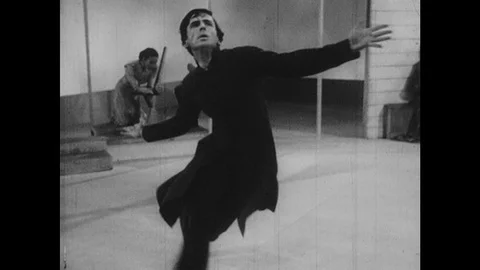 1950s: Parson spins and preforms dramatic dance. Parson crawls on his knees and Stock Footage 126010836