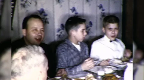 1950s People FAMILY DINNER Christmas Thanksgiving Meal Vintage Film Home Movie Stock Footage