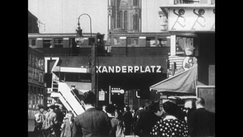 1950s: People in a metropolitan area do their activities of daily living. Stock Footage