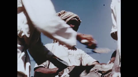 1950s: People work constructing building. Building under construction. Car Video stock 161734691