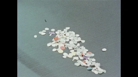 1950s: Plastic comb attracts and collects tiny paper fragments, while the iconic Video stock 84860003