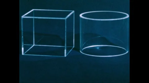 1950s: Plastic containers on table, cones appear inside containers, containers Stock Footage 240676752