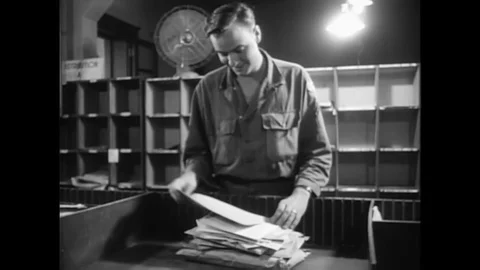 1950s - The process of using US army fixed-wing planes to send mail in 1950s Stock Footage 145416031