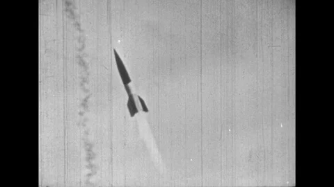 1950s: Rocket launches, flies erratically / View of destroyed rocket / Men Stock Footage