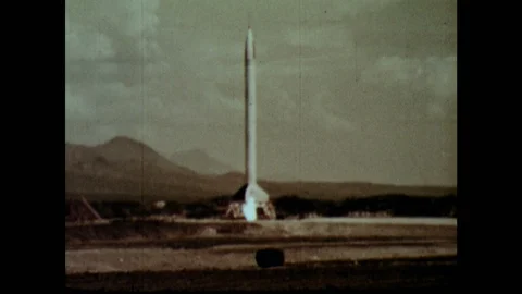 1950s: Rocket launches.  Rocket crashes and burns. Stock Footage 124817138