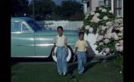 1950S San Francisco: Family Has A Cookout In House Yard. Two Little Boys Holding Stock Footage