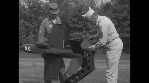 1950s - Sergeant Stuart Queen presents the Tiny Dart, Redstone, and Jupiter Stock Footage 85959000