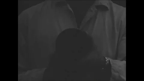 1950s - Solid rocket fuel motors are shown in many sizes. A static test firing Video stock 86407724