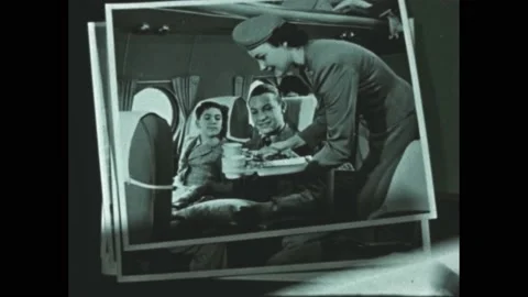 1950s: Stack of black and white photographs. Teen sits at drafting table. Stock Footage 170456398