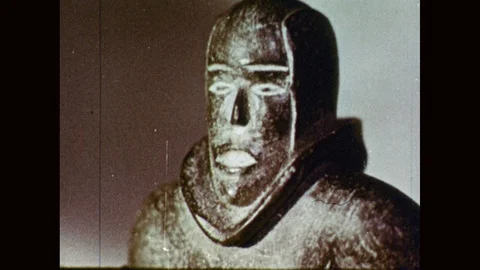 1950s: Statue of person inside igloo, dancing. Statue dances. Another statue Stock Footage 98008113