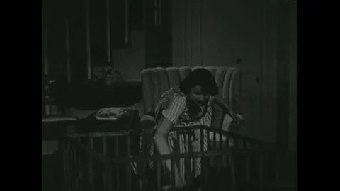 1950s : Student Babysitting Stockbeeldmateriaal 74622097