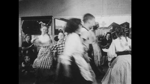 1950s: Students dance in classroom, clap, and sing. Stock Footage 94223890