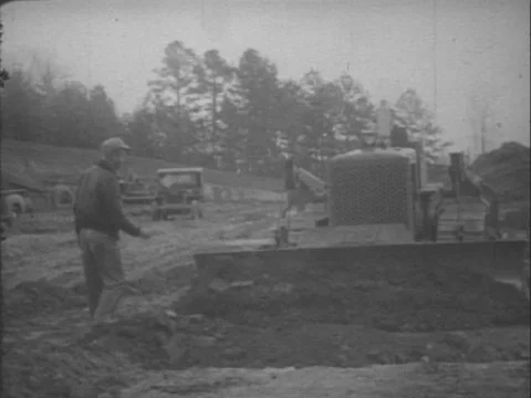1950s - Students learn to operate construction equipment and vehicles in Stock Footage 82938530