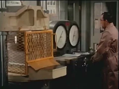 1950s- Tests are conduct in a lab on cement blocks, engineers test the quality Video stock 79456471