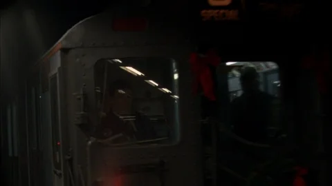 1950s train approaches the platform Stock Footage 112852090