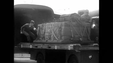 1950s - US Army doctors training to become paramedics take part in parachute Stock Footage 155854534