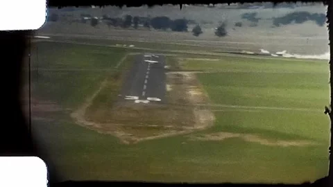 1950s View of runway from small plane. Vintage 8mm Home Video. Stock Footage 279860734