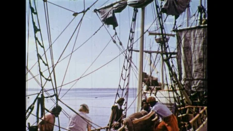 1950s: Views of colonists loading supplies on ships. Stock Footage 74485373