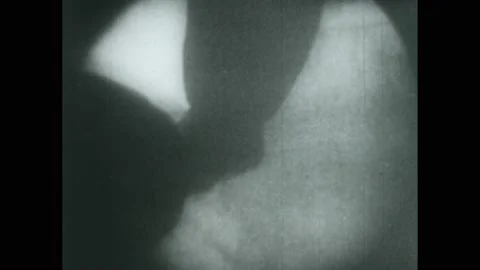 1950s: X-ray view of organs functioning. Food travels down esophagus. 動画素材 224169174