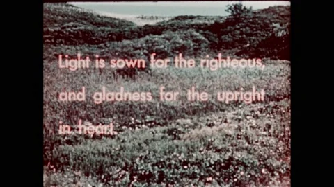 1950s:Religious scripture text superimposed over mountainous forest. Sunrise Stock Footage 232948215