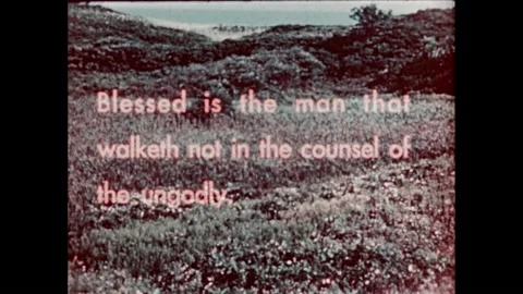 1950s:Religious scripture text superimposed over mountainous forest. Stock Footage 232948298