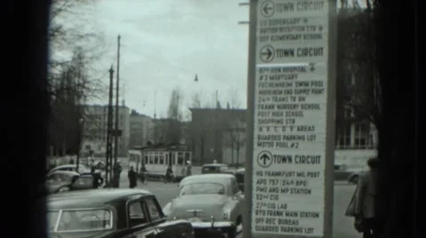 1951: city is seen with tall buildings along coastal area AUSTRIA Stock Footage