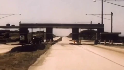 1951 - A family drives a convertible along the Pennsylvania Turnpike and they Stock Footage