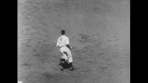 1951 : Joe DiMaggio rounds the bases after hitting a home run. Stock Footage
