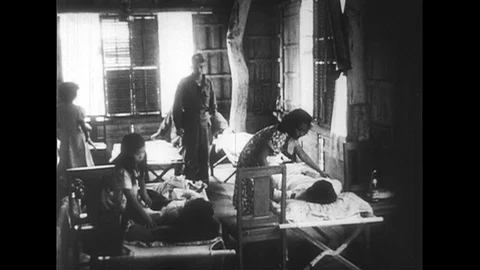 1951 : As patients are treated in makeshift hospitals, molten lava still Stock Footage