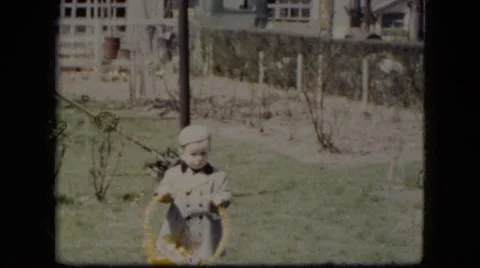 1951: Young Boy Carrying Easter Basket in Cleveland Ohio Neighborhood Vídeos de archivo 68198034
