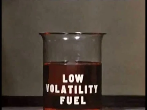 1952 _ A wick is set aflame in a beaker of low volatility fuel, and a model Stock Footage