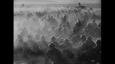 1952 : After atomic bomb detonation, a cloud of smoke forms as the ground shakes Stock Footage