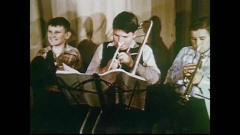 1952 - Elementary school students play "Jingle Bells" in band class. Stock Footage 155853556