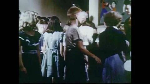 1952 - Elementary school students sing "Knick Knack Paddy Whack" in music class. Stock Footage 155856385