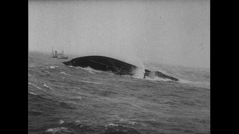 1952 : The Flying Enterprise sinks as waves pull it down. Stock Footage 74539102