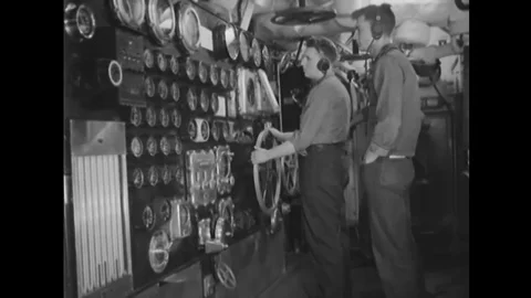 1952 - Operators are seen working in the engine room of the USS Wisconsin. Stock Footage 107670567
