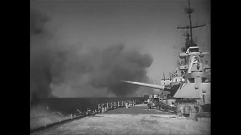 1952 - Sailors below deck load a battleships gun. Stock Footage 85954422